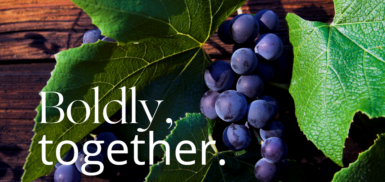 grapes on wood with text boldly together